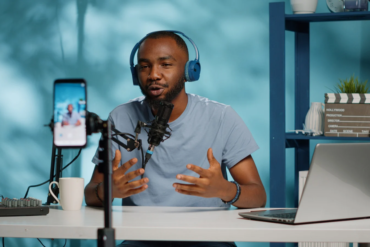 A creator recording a live video to engage an online audience as part of an active digital marketing campaign.