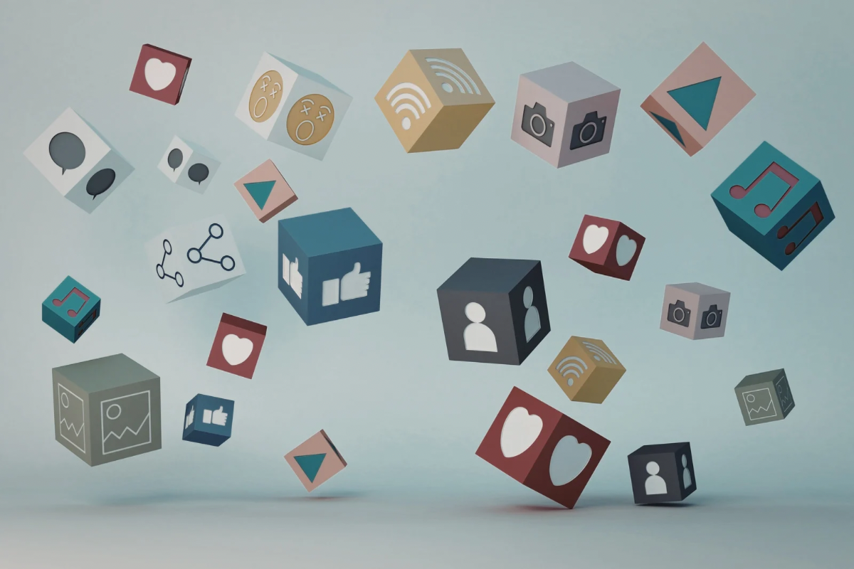 Floating cubes with icons for likes, profiles, music, chat, and analytics on a light background.
